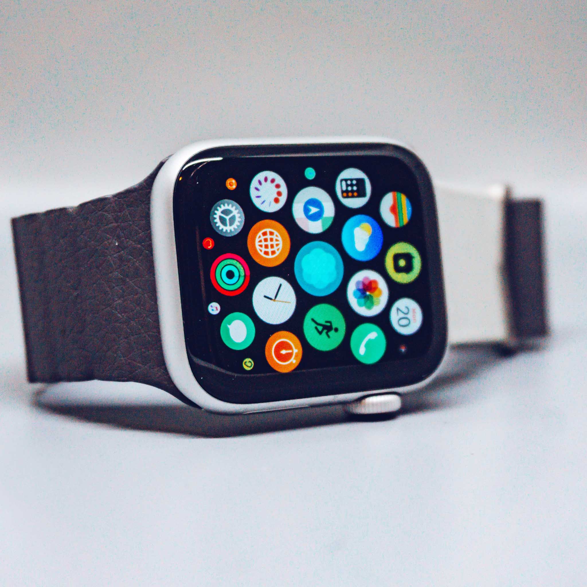 Smartwatch with a black band on a light gray background